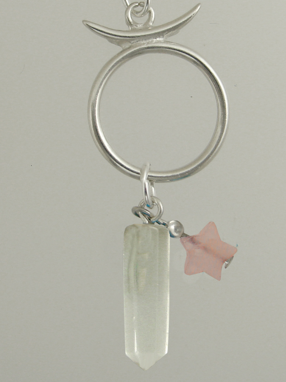 Sterling Silver Taurus Pendant Necklace With an Clear Crystal And a Rose Quartz Star